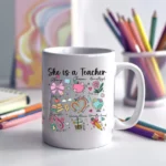 She is a Teacher Mug UVDTF Sticker design on a ceramic mug mockup, ideal for vibrant customized craft gifts.