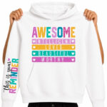 White hoodie mockup with a colourful positive affirmation DTF transfer design that says “Awesome, Intelligent, Loved, Beautiful, Worthy” on the front and “This is your reminder” on the sleeve.