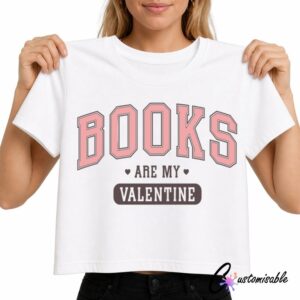 White T-shirt with pink and brown “Books Are My Valentine” DTF transfer design featuring varsity-style lettering and small heart accents.