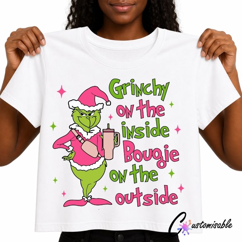 DTF Transfer Bougie Grinch White T-shirt with a colourful Christmas character DTF transfer design and the phrase “Grinchy On The Inside Bougie On The Outside.”
