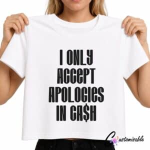 White T-shirt with bold black text reading “I Only Accept Apologies In Cash” in a stacked DTF transfer design.