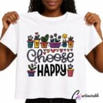 White T-shirt with colourful “Choose Happy” DTF transfer design featuring potted plants, flowers, hearts, and hand-drawn lettering.
