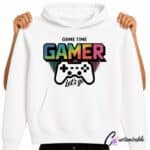 White hoodie with colourful “Game Time Gamer Let’s Go” DTF transfer design featuring a game controller, pixel-style lettering, and rainbow graphic accents.